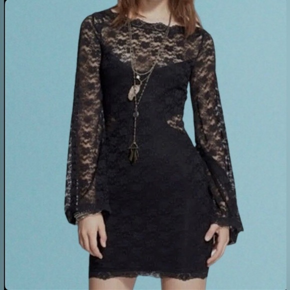 Free People Dresses & Skirts - FREE PEOPLE black lace bodycon dress with dramatic bell sleeves and sheer panels